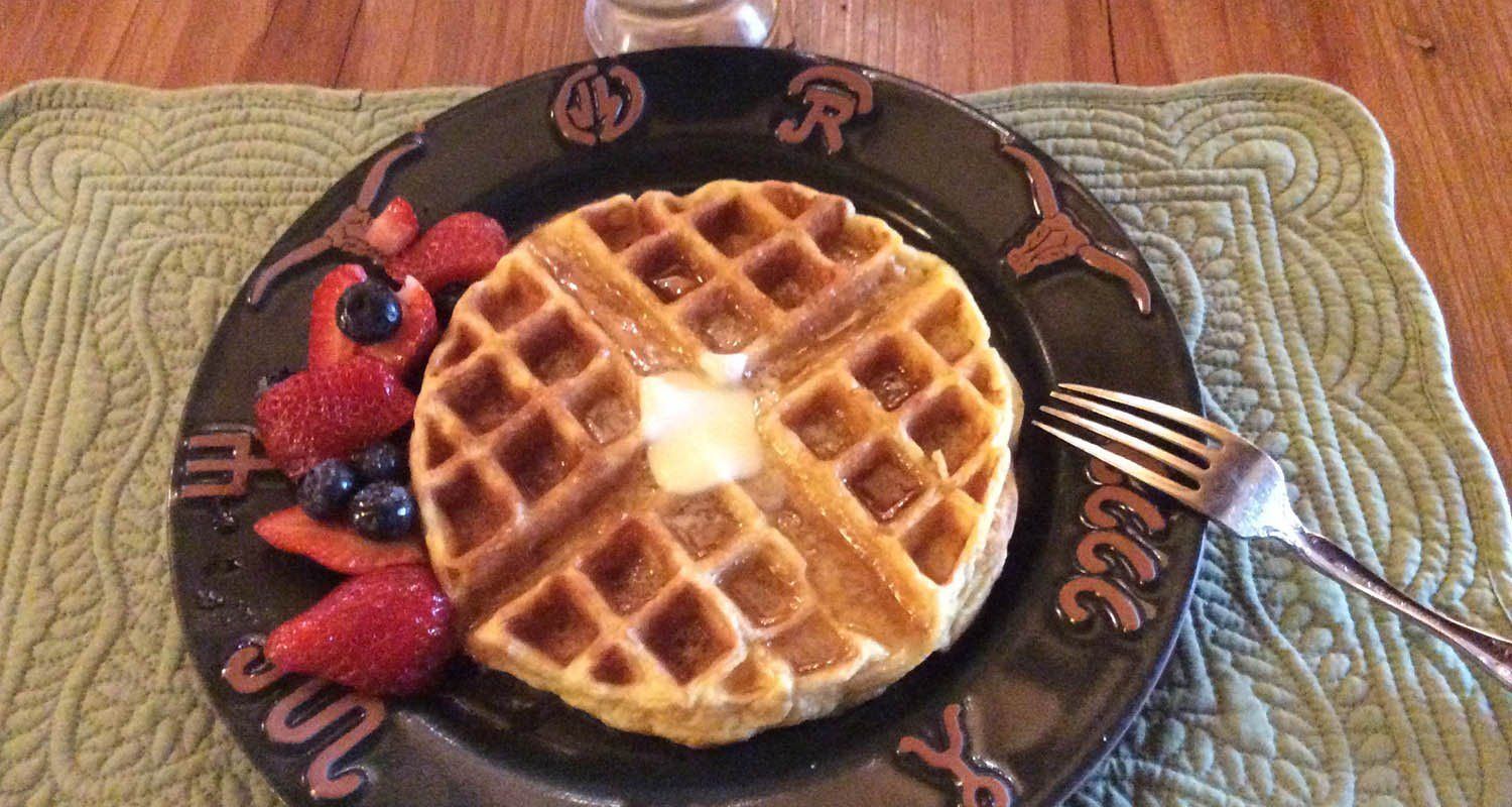 Waffles with butter and berries