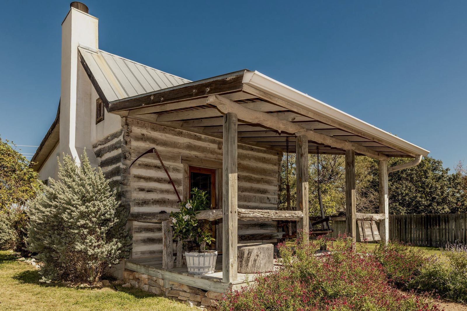 Log cabin exterior with porch